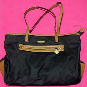 Michael Kors Black Tote with Brown Trim and Gold Hardware
